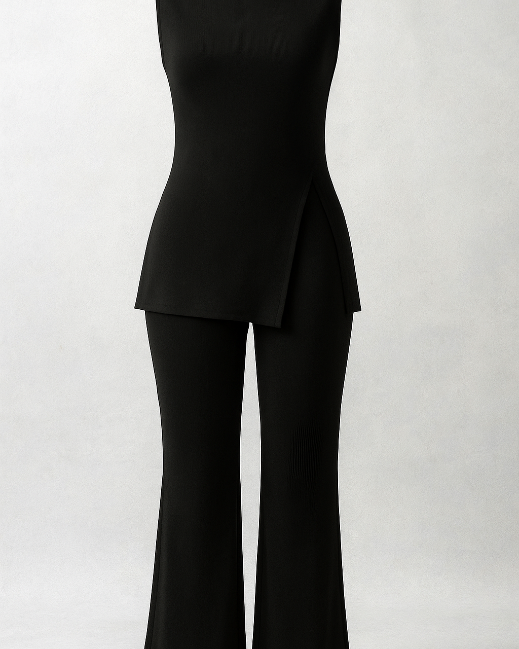 Eva | Elegant Rib Coordinated Set med Asymmetrisk Top og Løse Bukser - Sort - Eva | Elegant Rib Coordinated Set med Asymmetrisk Top og Løse Bukser - €25 - {{ product_tags }