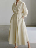 Elegant Solid Midi Dress with Notched Collar and Pockets Buttons